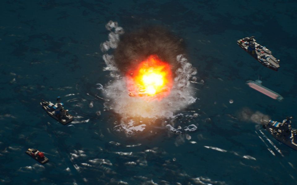 The same naval hit after the change, a smaller fireball with white spray and rings on the surface